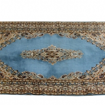 שטיח פרסי 'קרמן' ישן בגוון טורקיז תכול