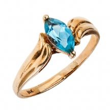 טבעת זהב משובצת אבן טופז כחולה