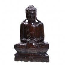 פסל עץ ישן בדמות בודהה