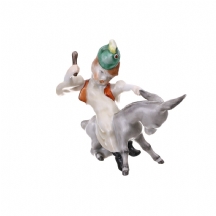 פסלון פורצלן הונגרי מתוצרת: 'הרנד', בדמות ילד רכוב על גב חמור