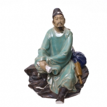פסל סיני עשוי טרקוטה ומעוטר בחלקו בזיגוג צבעוני