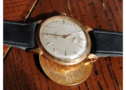 שעון יד ישן לגבר מתוצרת: 'Doxa', עשוי זהב צהוב 18 קארט