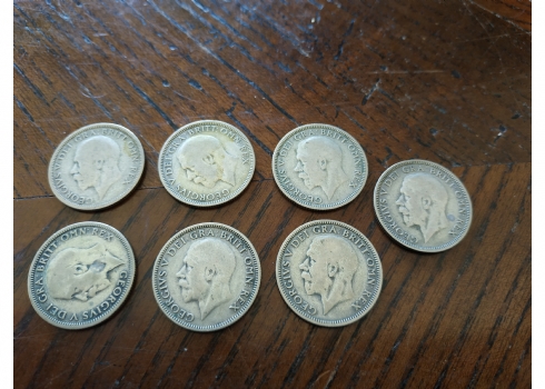 לוט של 7 מטבעות כסף אנגלים, של שילינג אחד