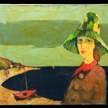 ''אישה עם כובע ירוק על שפת הים'