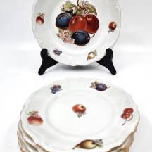 סט הגשה גרמני לפירות מתוצרת 'רוזנטל' (Rosenthal), עשוי פורצלן מעוטר בהדפסים וחתו