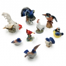 9 פסלוני פורצלן שונים בדמות ציפורים