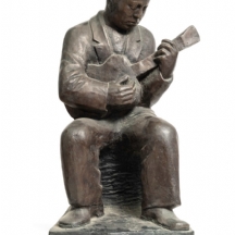 יעקב לוצ'אנסקי (Jacques Loutchansky) - 'נגן הגיטרה' - פסל ברונזה