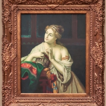 פורטרט נערה חולמנית שמן על בד, נתון במסגרת נאה