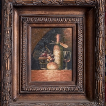 טבע דומם עם בקבוק יין וסל ענבים