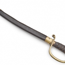 פגיון עשוי פליז, עץ ועור